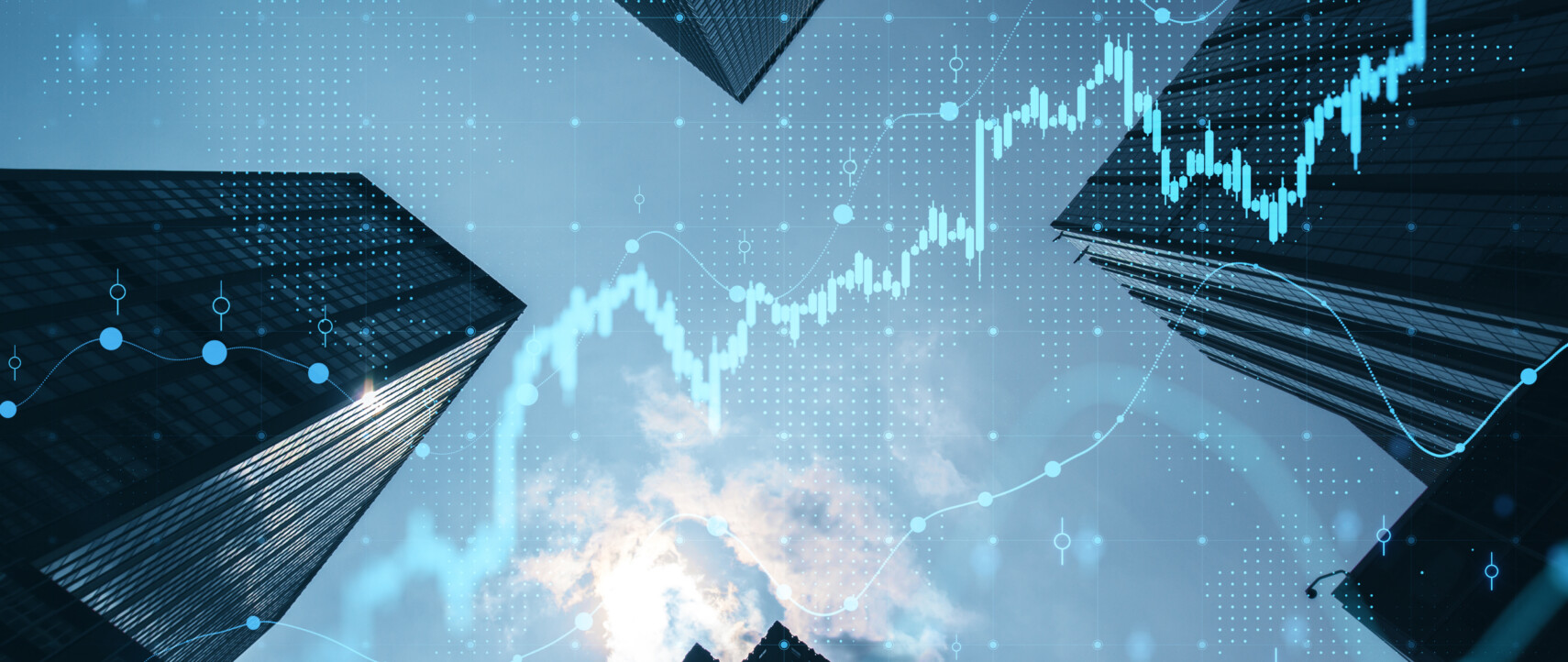 Real Estate And Investment Concept With Bottom View On Sunny Skyscrapers Tops And Digital Financial Chart With Stock Market Diagram